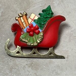 Vintage hallmark xmas sleigh brooch pin